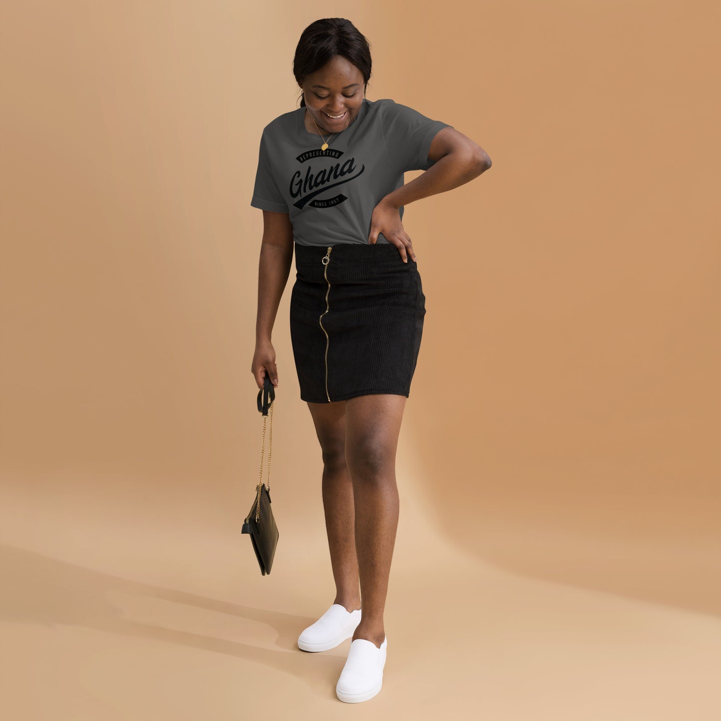 Black professional wearing African-inspired short sleeve tee