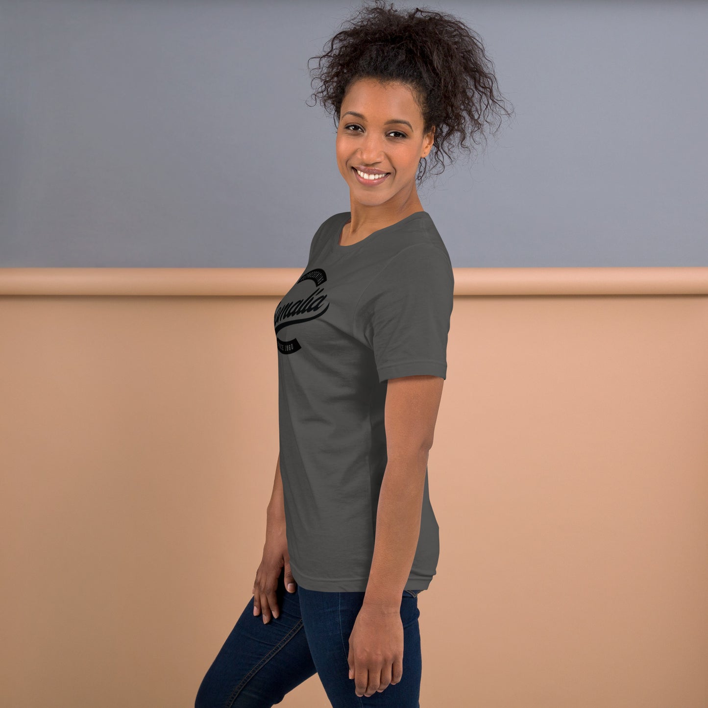 Black professional wearing African-inspired short sleeve tee