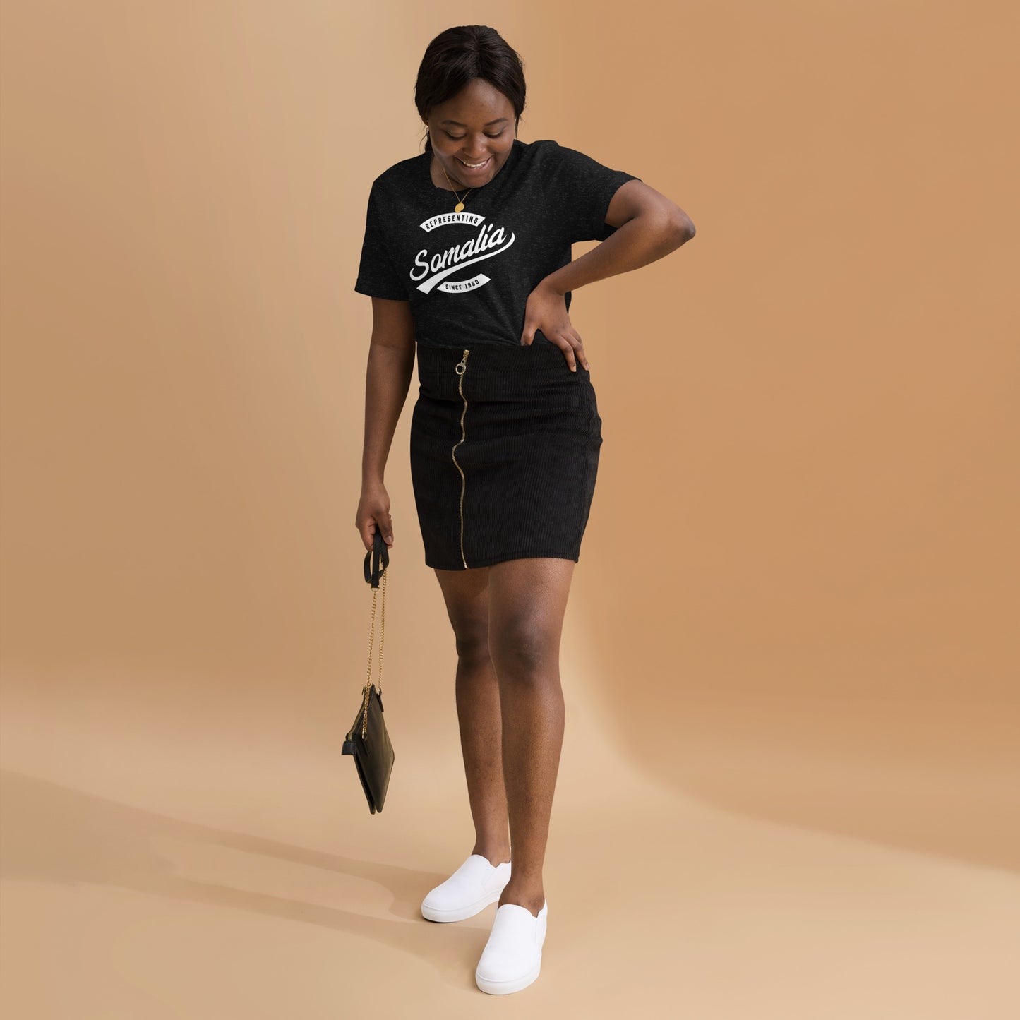 Black professional wearing African-inspired short sleeve tee