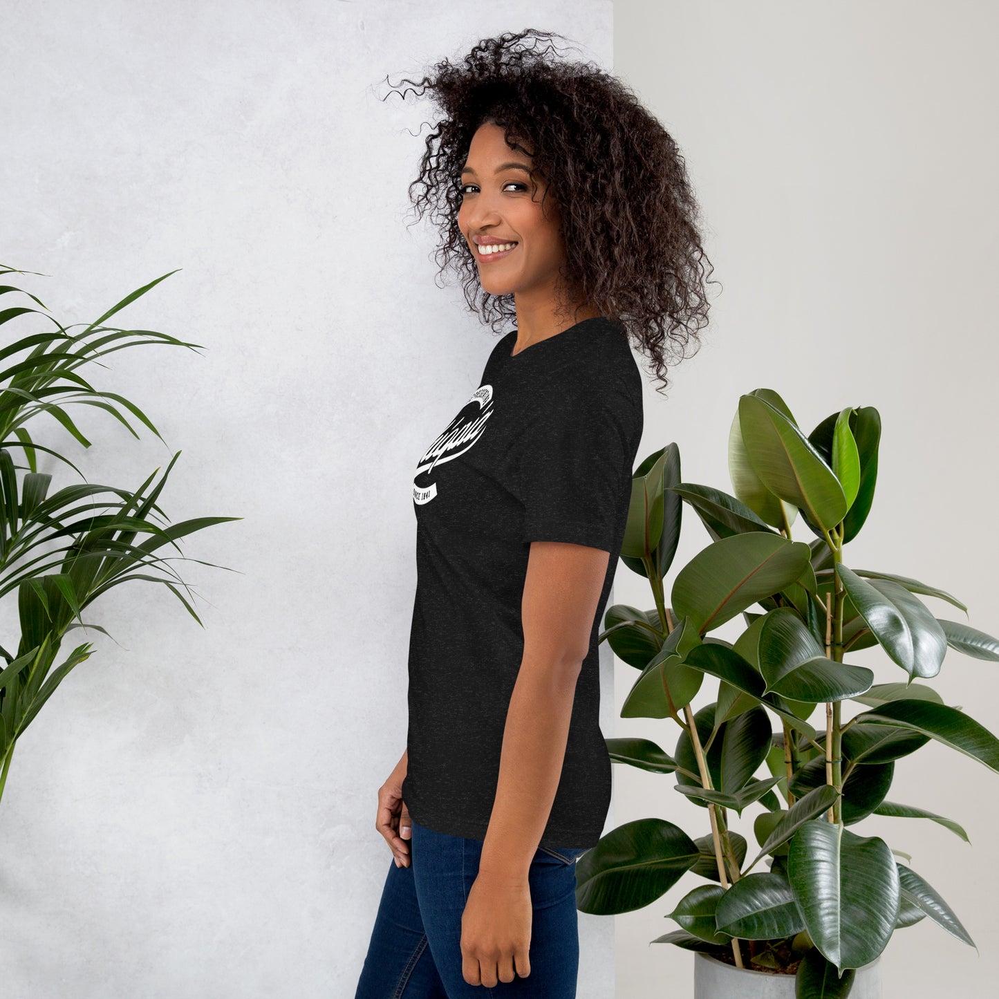 Black professional wearing African-inspired short sleeve tee