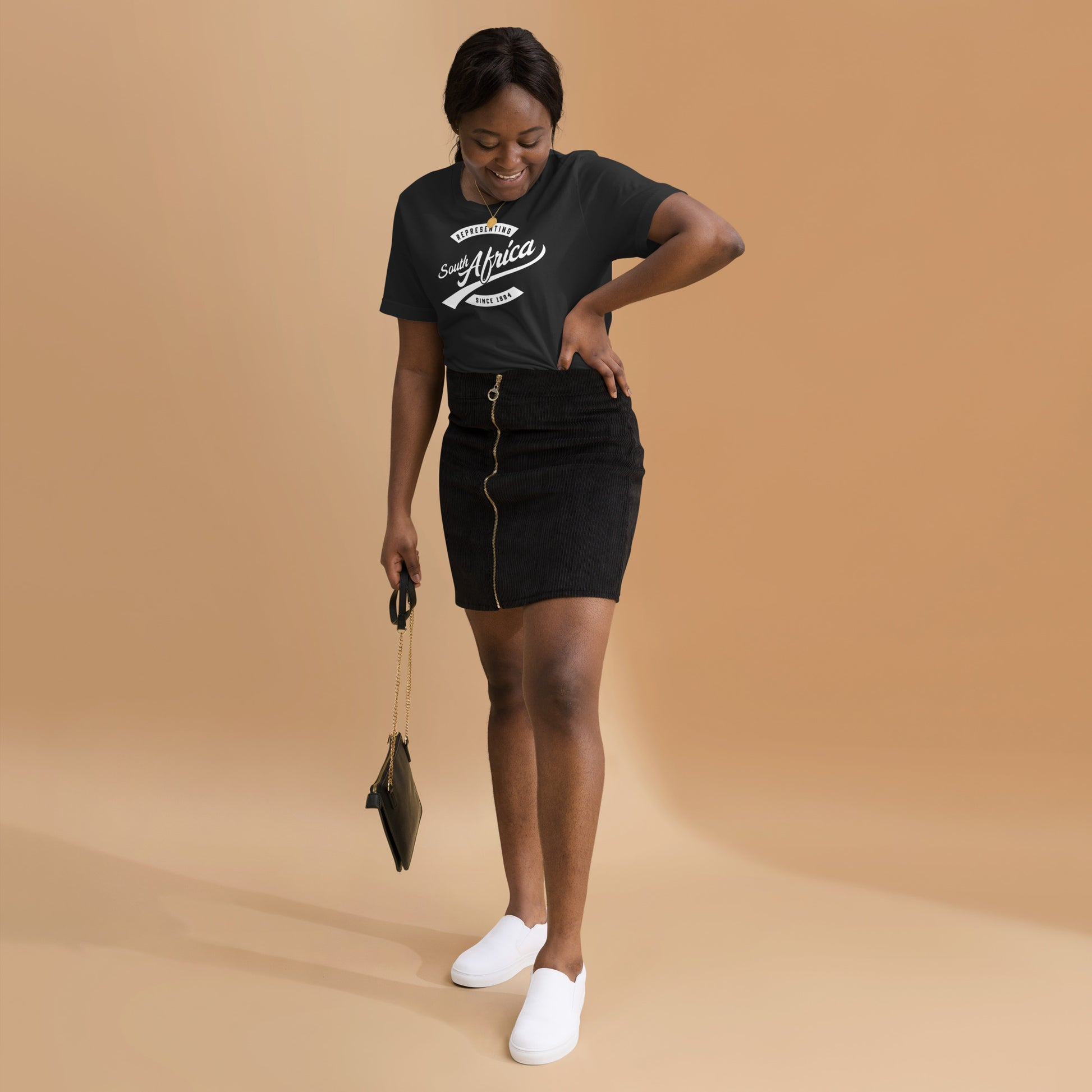 Black professional wearing African-inspired short sleeve tee