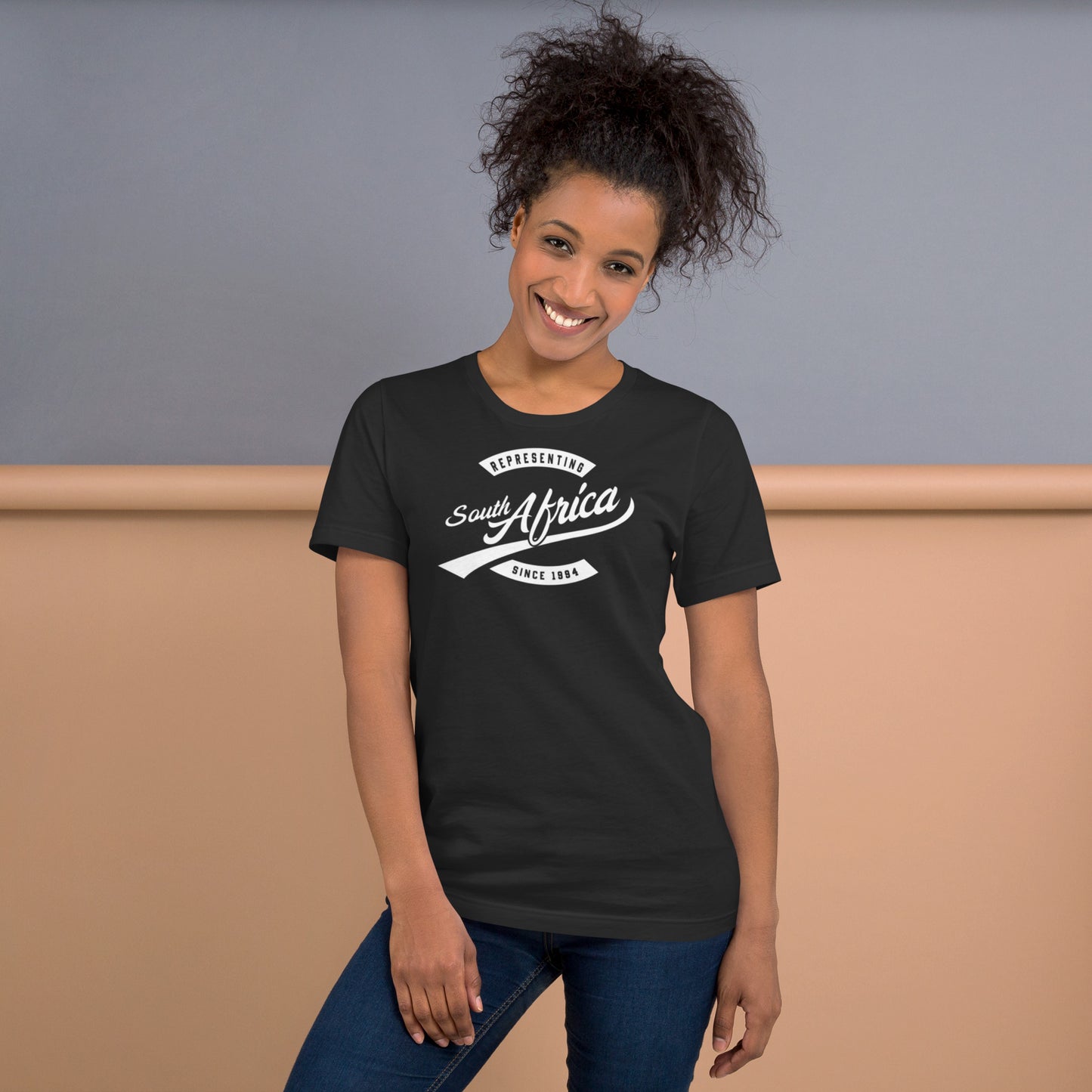 Black professional wearing African-inspired short sleeve tee