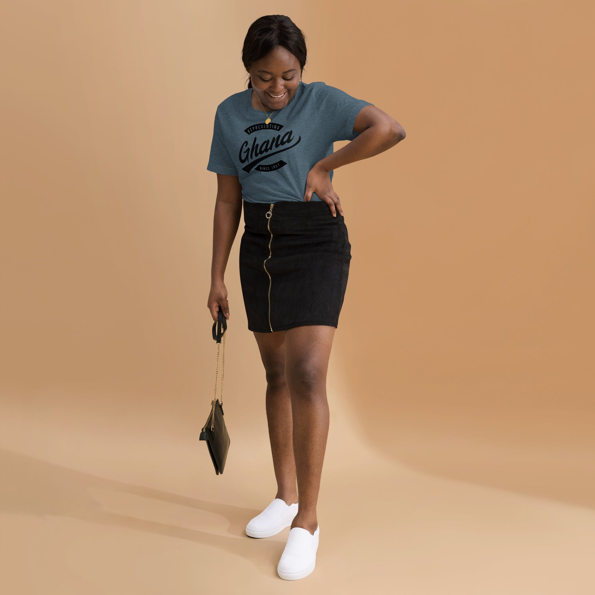 Black professional wearing African-inspired short sleeve tee