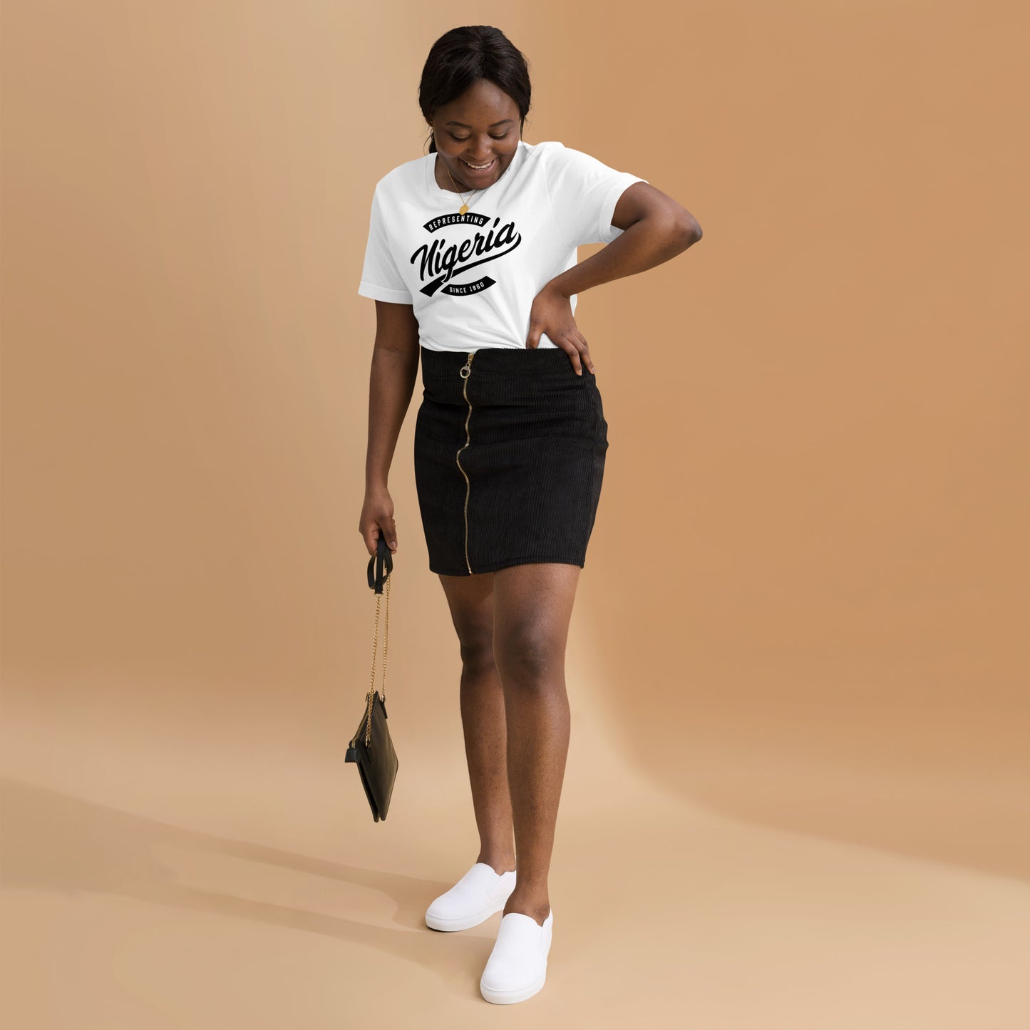 Black professional wearing African-inspired short sleeve tee